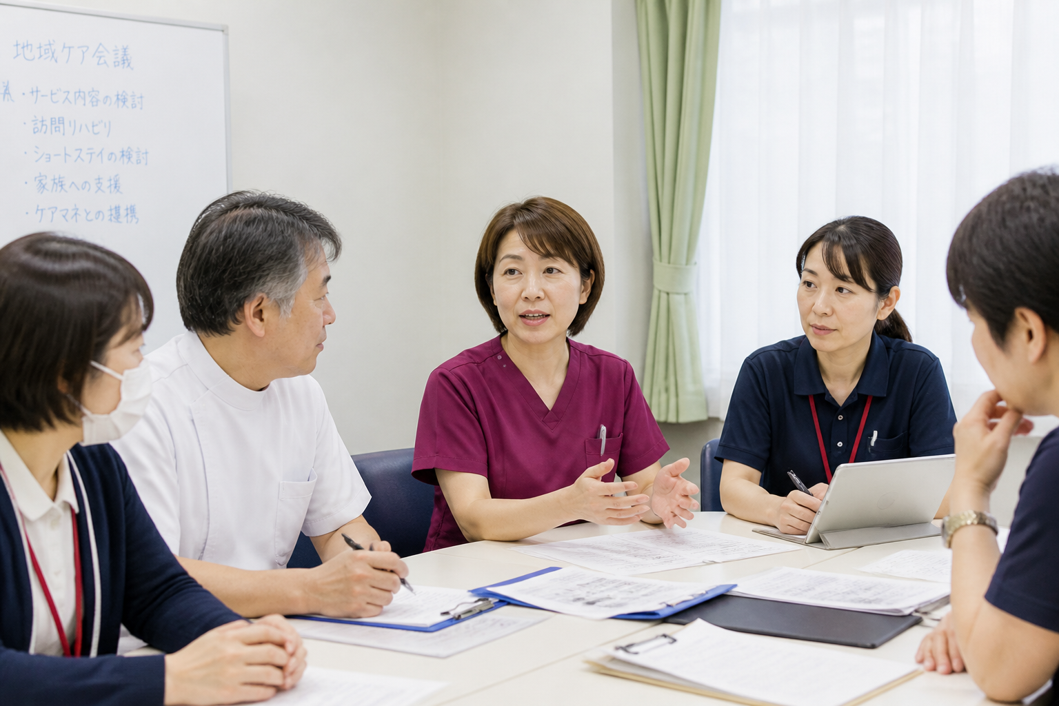 板橋区の訪問看護管理者が地域医療連携の多職種カンファレンスに参加している様子